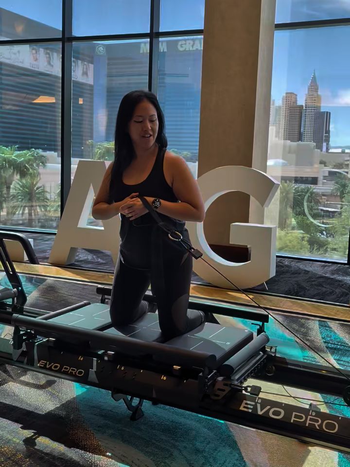 Andrea Ruelas on an Evo Pro machine at the Lagree Summit 2026 in Las Vegas